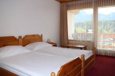 Двухместный номер с 2 отдельными кроватями и видом на горы