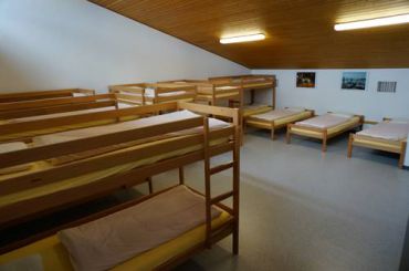 1-спальная кровать в общем номере с 14 кроватями