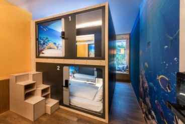 Underwater World Room with 4 Capsule Beds with shared bathroom 
