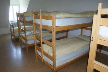 Односпальная кровать в общем номере (для 13 взрослых)